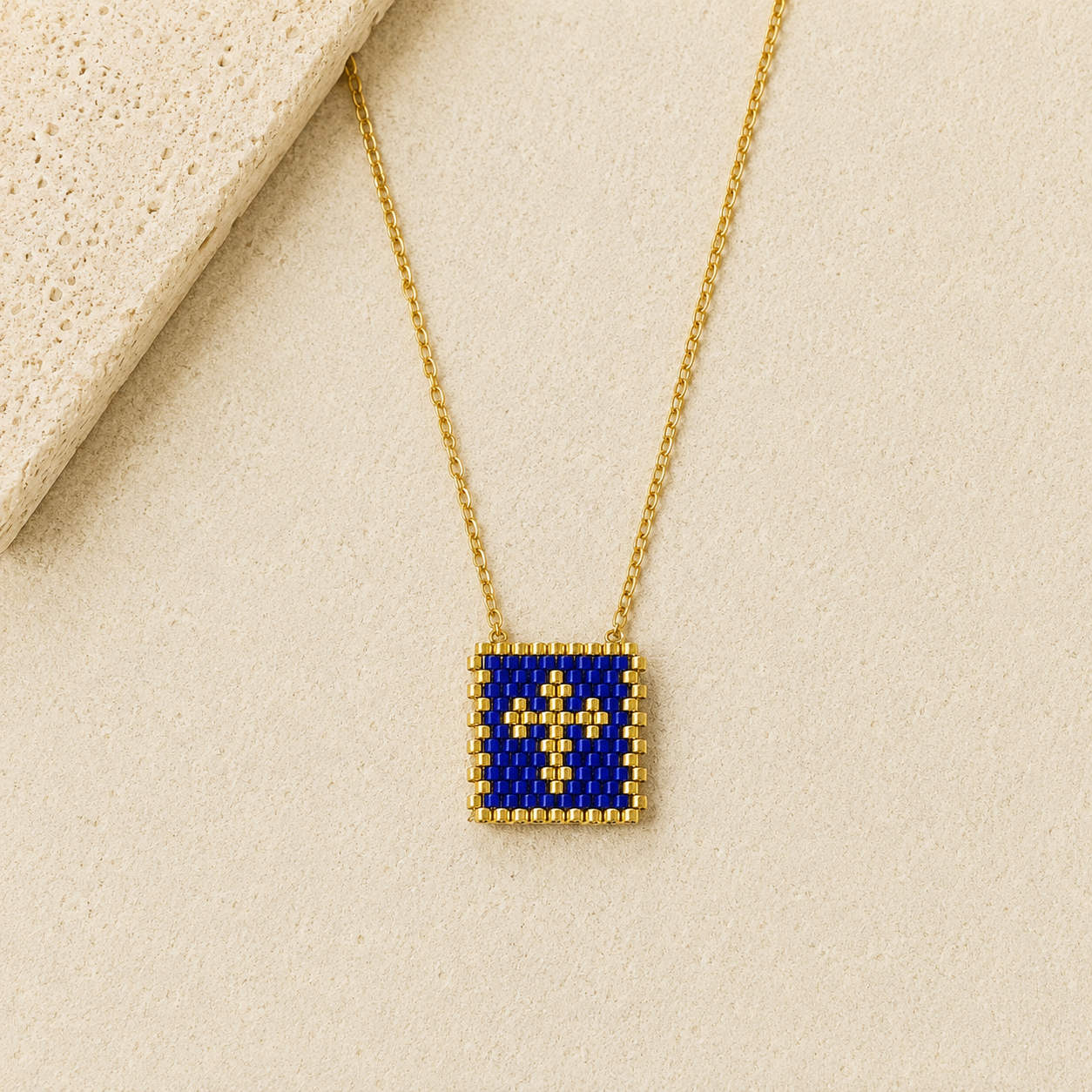 Blue & Gold HandwovenCross Necklacea